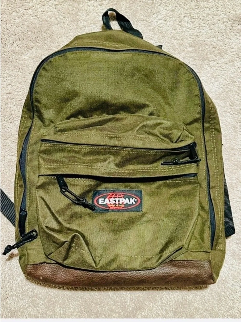 Eastpak Olive Green Backpack with Brown Base - Casual Everyday Pack